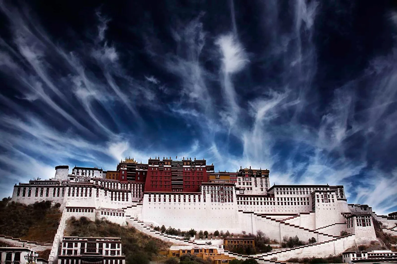 The full Potala Palace in Lhasa, Tibet — the white and red palace rising the whole height of Marpo Ri hill