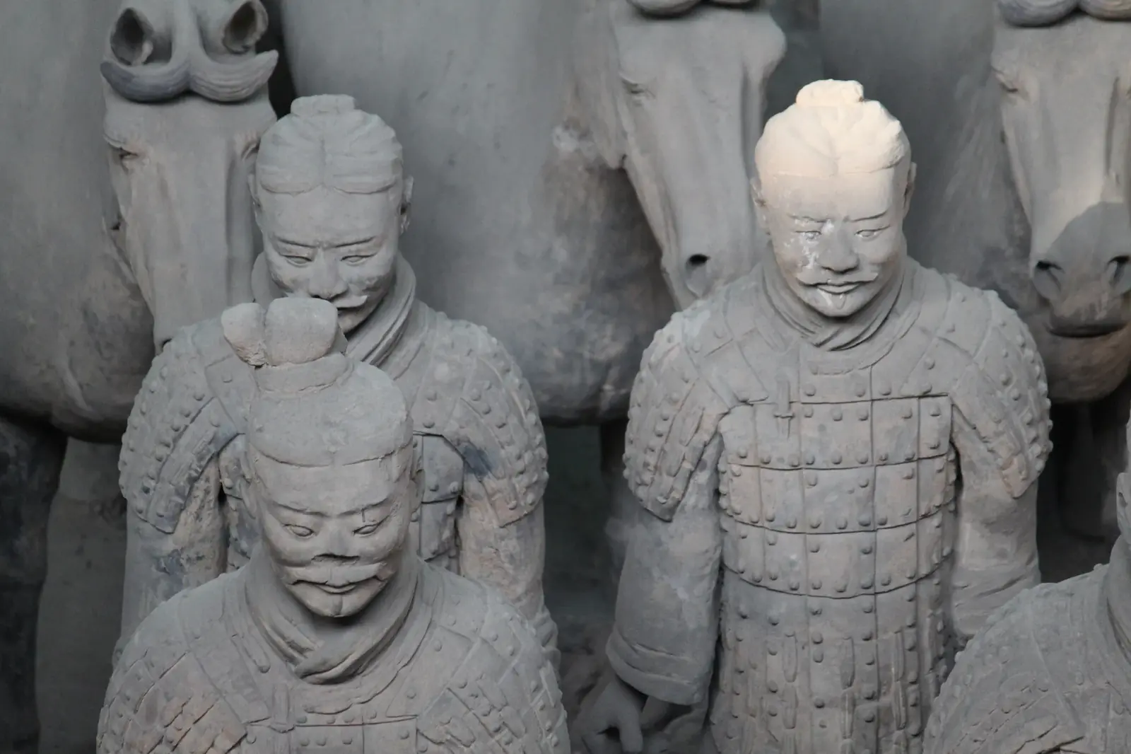 Terracotta Warriors and horses standing in the excavation pit in Xi'an